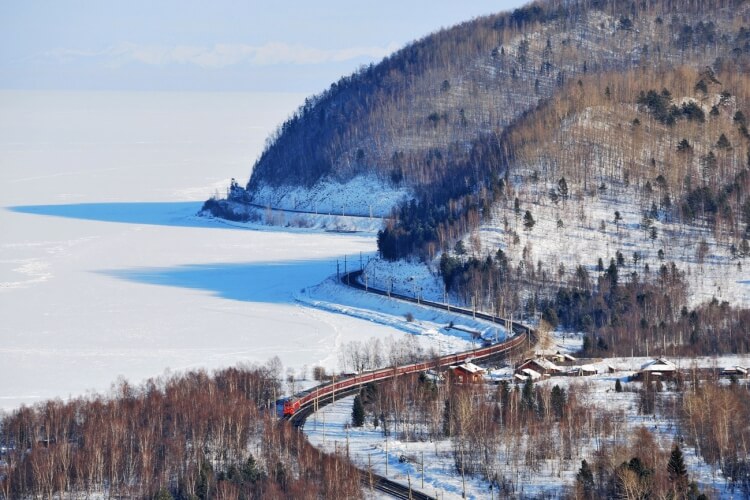 Trans-Siberian along winter lake Baikal.